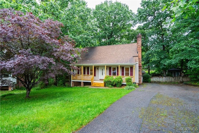 13100 Spring Trace Pl, Midlothian, VA 23112 - view of front of house with a porch, a chimney, asphalt driveway, and roof with shingles