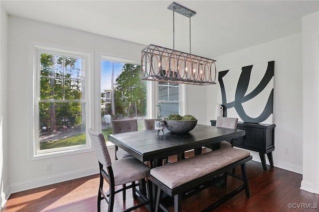 17912 Pine Canyon Trl, Moseley, VA 23120 - dining area featuring baseboards, dark wood-type flooring, and a chandelier