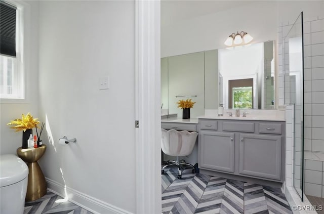 17912 Pine Canyon Trl, Moseley, VA 23120 - full bath featuring toilet, vanity, baseboards, and a tile shower