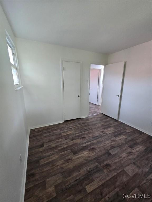 4811 Altair Rd, Henrico, VA 23231 - unfurnished room with dark wood-style flooring and baseboards