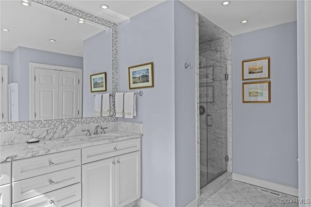 20031 Woodland Fox Ln, Rockville, VA 23146 - bathroom featuring baseboards, marble finish flooring, vanity, a shower stall, and recessed lighting