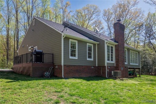 20031 Woodland Fox Ln, Rockville, VA 23146 - view of home's exterior with a lawn, a chimney, cooling unit, and a deck