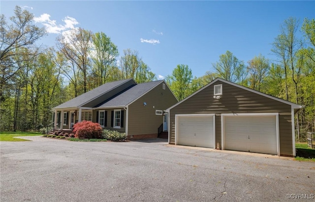20031 Woodland Fox Ln, Rockville, VA 23146 - view of front of home with a garage and an outbuilding