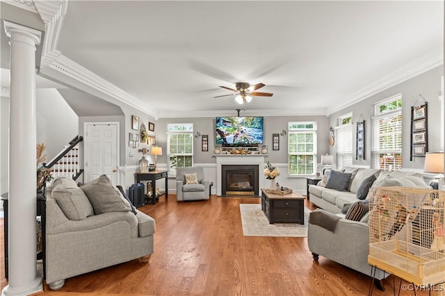 8412 Newbys Mill Dr, Chesterfield, VA 23832 - living area with decorative columns, ceiling fan, ornamental molding, wood finished floors, and stairs