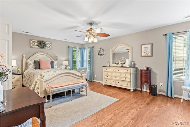 8412 Newbys Mill Dr, Chesterfield, VA 23832 - bedroom featuring multiple windows, light wood-style flooring, and ceiling fan
