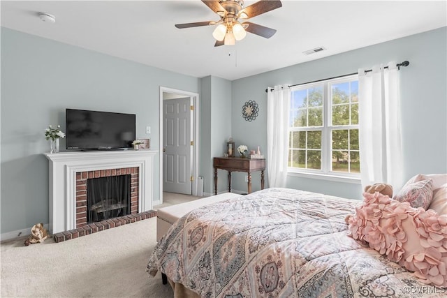 8412 Newbys Mill Dr, Chesterfield, VA 23832 - carpeted bedroom with a brick fireplace and a ceiling fan