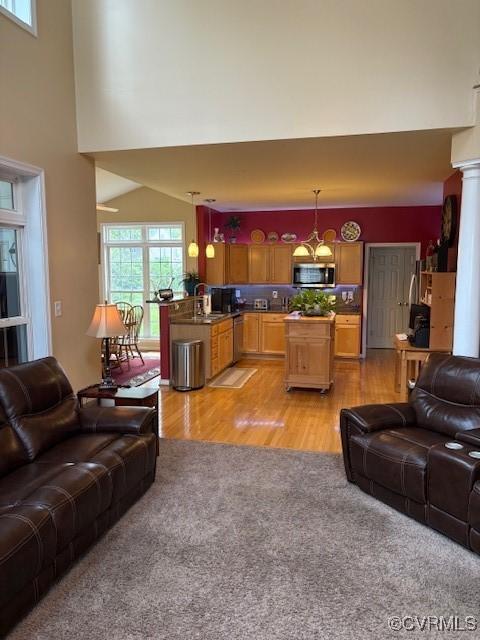 11292 Silverstone Dr, Mechanicsville, VA 23116 - living room featuring light carpet and light wood-type flooring