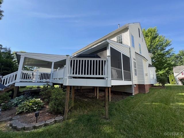 11292 Silverstone Dr, Mechanicsville, VA 23116 - back of property featuring a sunroom, a yard, and a deck