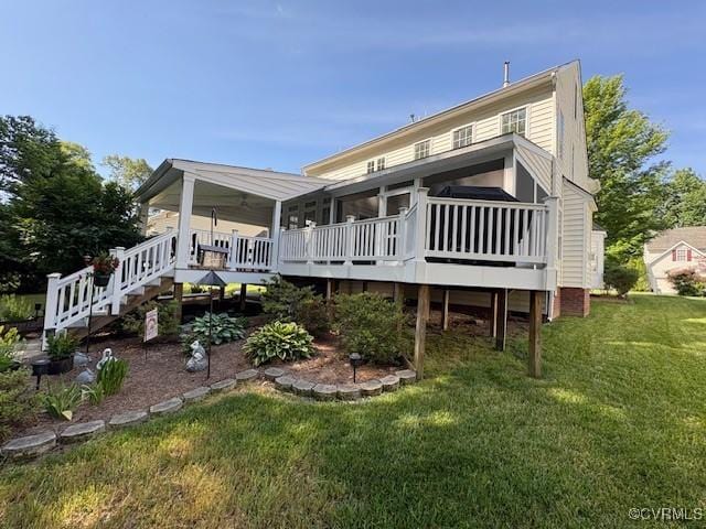 11292 Silverstone Dr, Mechanicsville, VA 23116 - rear view of house featuring a lawn, a deck, a sunroom, and stairs