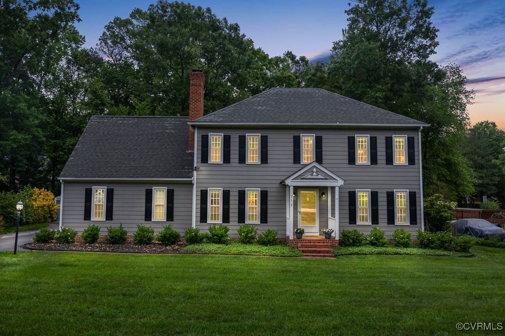 717 Shadowhill Ct, Midlothian, VA 23114 - colonial house with a chimney, a yard, and roof with shingles