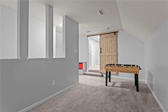8324 Longlands Pl, Chesterfield, VA 23832 - game room with carpet, baseboards, a barn door, and vaulted ceiling