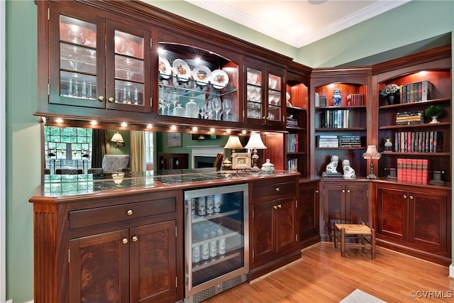 522 Hunt Field Rd, Manakin Sabot, VA 23103 - indoor dry bar with beverage cooler, crown molding, and light wood-style flooring