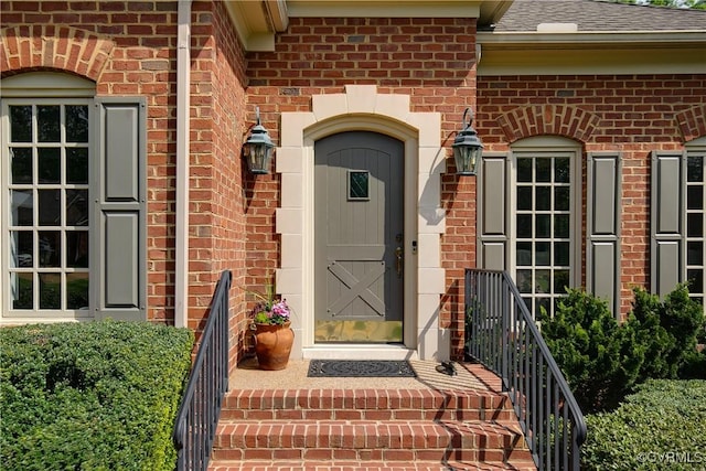 522 Hunt Field Rd, Manakin Sabot, VA 23103 - view of exterior entry with brick siding and a shingled roof