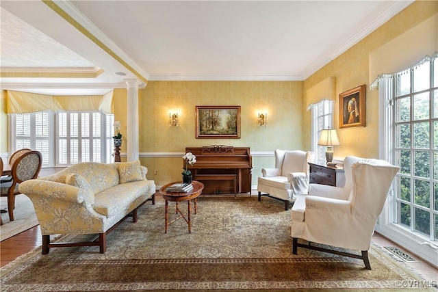 522 Hunt Field Rd, Manakin Sabot, VA 23103 - living area featuring crown molding, wood finished floors, and decorative columns