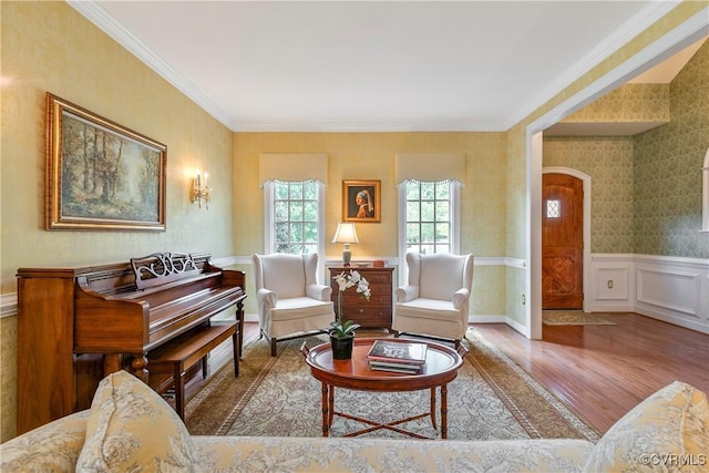 522 Hunt Field Rd, Manakin Sabot, VA 23103 - living area featuring wood finished floors, arched walkways, crown molding, and wainscoting