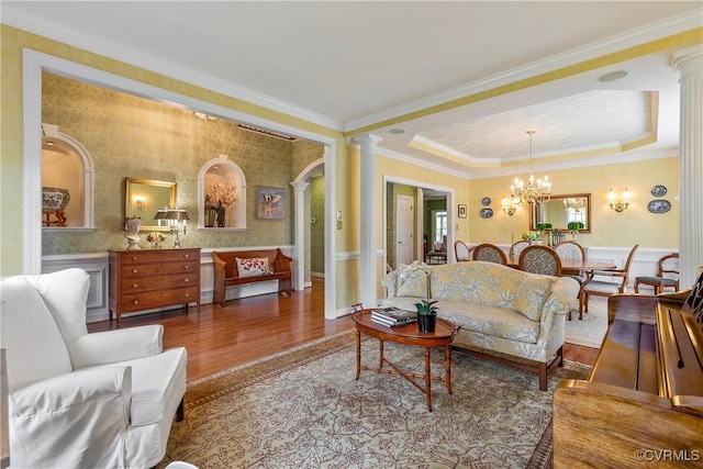 522 Hunt Field Rd, Manakin Sabot, VA 23103 - living area with ornate columns, wood finished floors, ornamental molding, a chandelier, and wainscoting