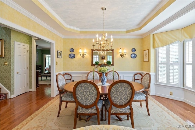 522 Hunt Field Rd, Manakin Sabot, VA 23103 - dining room featuring a chandelier, light wood-style floors, a wainscoted wall, wallpapered walls, and a tray ceiling