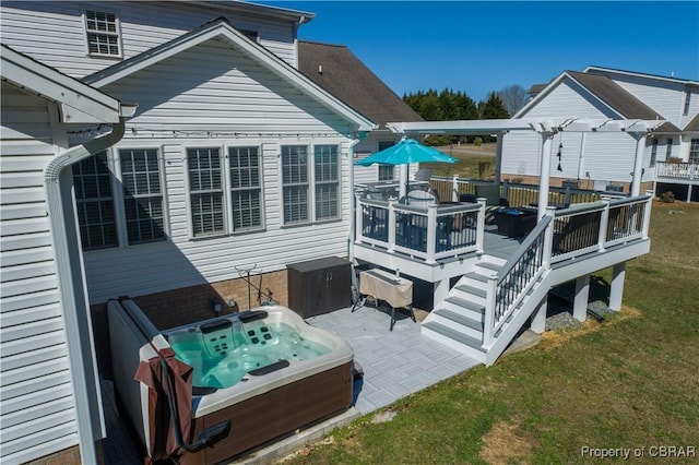 274 Meadow Dr, Tappahannock, VA 22560 - back of house featuring a hot tub, a deck, a pergola, a yard, and outdoor dining space