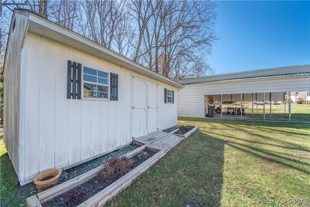 274 Meadow Dr, Tappahannock, VA 22560 - view of property exterior featuring a yard and an outdoor structure
