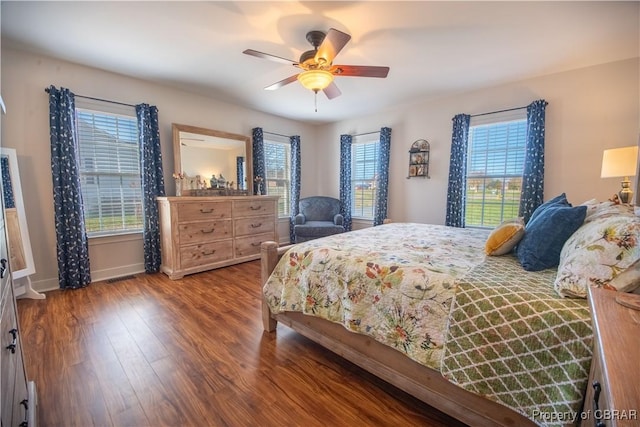 274 Meadow Dr, Tappahannock, VA 22560 - bedroom featuring wood finished floors, baseboards, and a ceiling fan