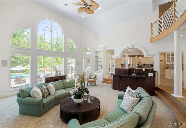 203 Randolph Square Ln, Richmond, VA 23238 - living room with a towering ceiling, ceiling fan, and light carpet