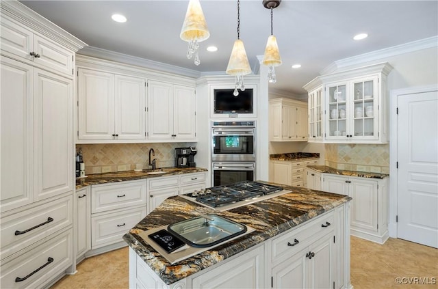 203 Randolph Square Ln, Richmond, VA 23238 - kitchen with stainless steel appliances, a kitchen island, dark stone counters, glass insert cabinets, and white cabinetry