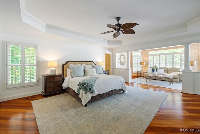 203 Randolph Square Ln, Richmond, VA 23238 - bedroom featuring a tray ceiling, ornamental molding, decorative columns, hardwood / wood-style floors, and a ceiling fan