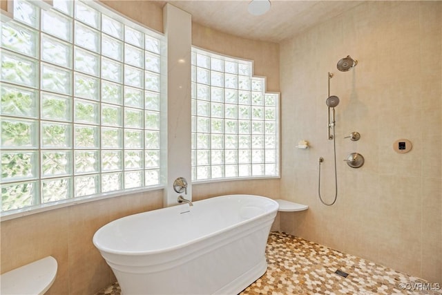 203 Randolph Square Ln, Richmond, VA 23238 - bathroom featuring a soaking tub, a tile shower, toilet, and tile patterned floors