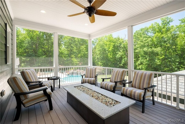 203 Randolph Square Ln, Richmond, VA 23238 - deck featuring a fire pit, a ceiling fan, an outdoor pool, and view of wooded area