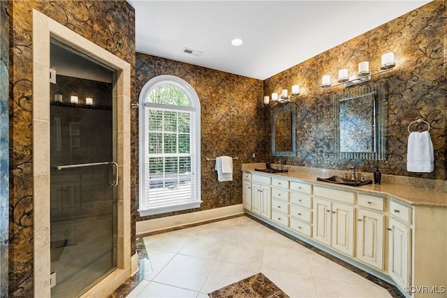 203 Randolph Square Ln, Richmond, VA 23238 - full bathroom with double vanity, a shower stall, tile patterned floors, and baseboards