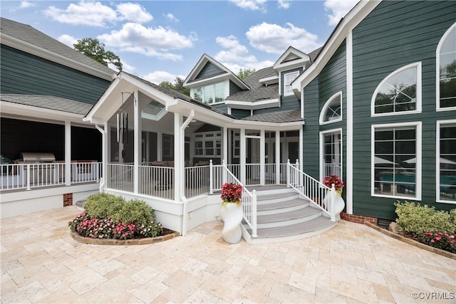 203 Randolph Square Ln, Richmond, VA 23238 - back of house with a sunroom and roof with shingles