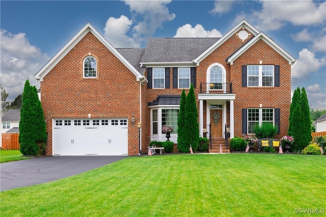 4317 Allenbend Rd, Glen Allen, VA 23060 - colonial inspired home with a front yard, an attached garage, brick siding, and driveway