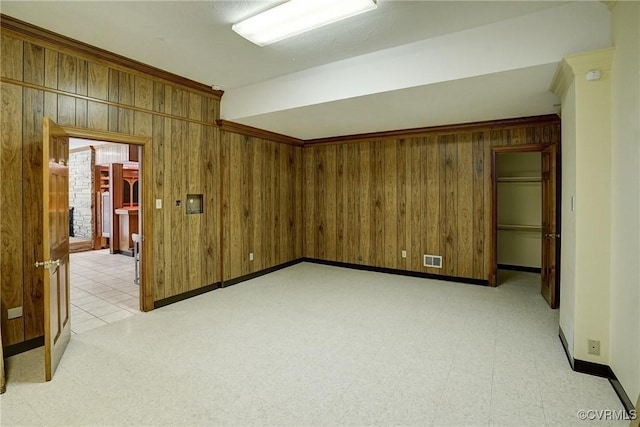 3320 Traylor Dr, Richmond, VA 23235 - unfurnished room with wood walls, baseboards, and crown molding