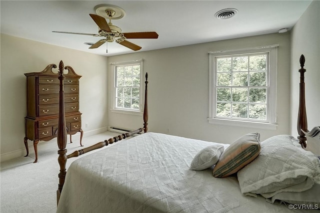 3320 Traylor Dr, Richmond, VA 23235 - bedroom with baseboard heating, carpet flooring, baseboards, and ceiling fan