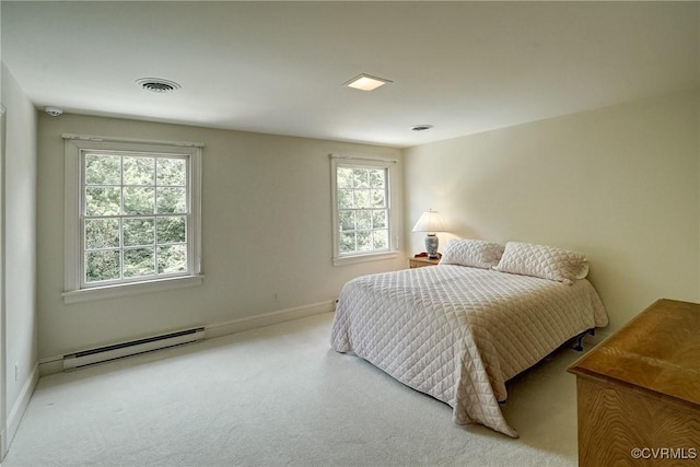 3320 Traylor Dr, Richmond, VA 23235 - bedroom with a baseboard radiator, carpet floors, and baseboards