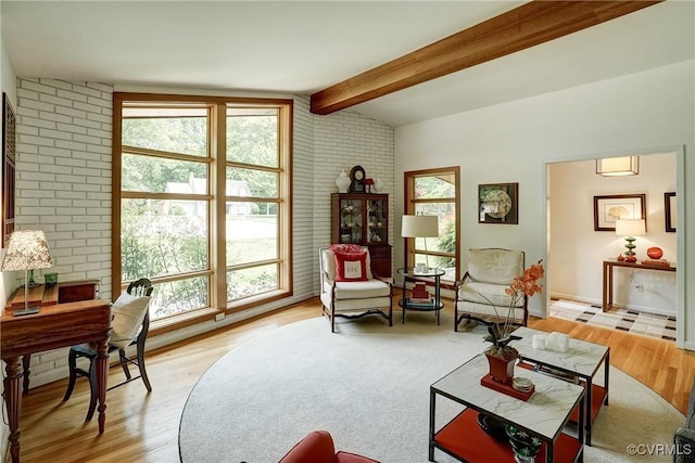 2940 Queenswood Rd, Midlothian, VA 23113 - living area featuring light wood-style floors and brick wall