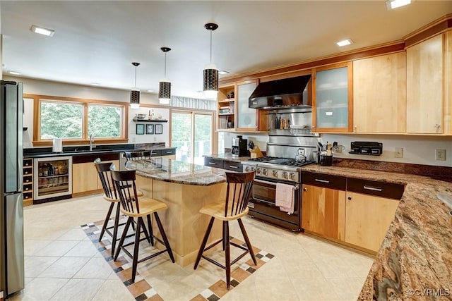 2940 Queenswood Rd, Midlothian, VA 23113 - kitchen featuring wall chimney exhaust hood, beverage cooler, appliances with stainless steel finishes, a kitchen breakfast bar, and light stone counters