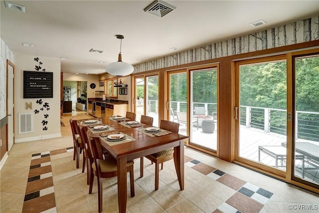 2940 Queenswood Rd, Midlothian, VA 23113 - dining area featuring light tile patterned floors, baseboards, and wallpapered walls