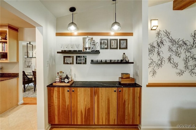 2940 Queenswood Rd, Midlothian, VA 23113 - indoor wet bar featuring light tile patterned floors and decorative light fixtures