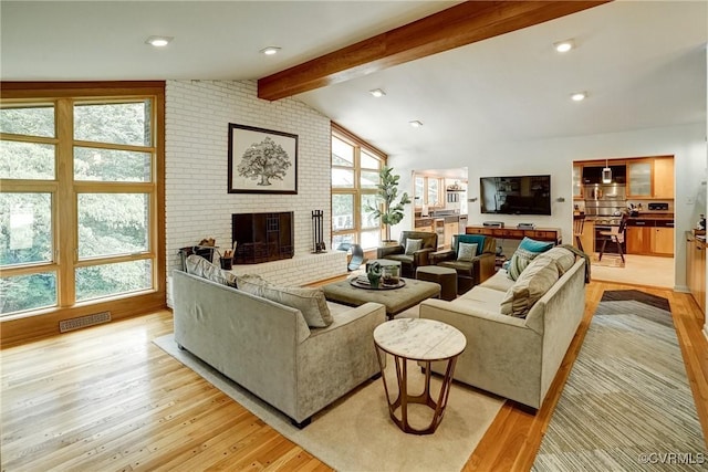2940 Queenswood Rd, Midlothian, VA 23113 - living area with light wood finished floors and a fireplace