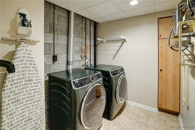 2940 Queenswood Rd, Midlothian, VA 23113 - laundry area with washer and dryer, baseboards, and light tile patterned floors
