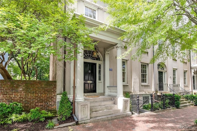 2311 E Broad St, Richmond, VA 23223 - property entrance featuring stucco siding