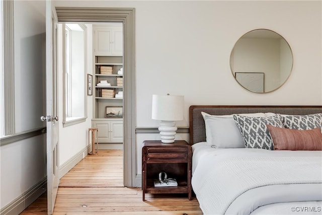 2311 E Broad St, Richmond, VA 23223 - bedroom featuring light wood finished floors and baseboards