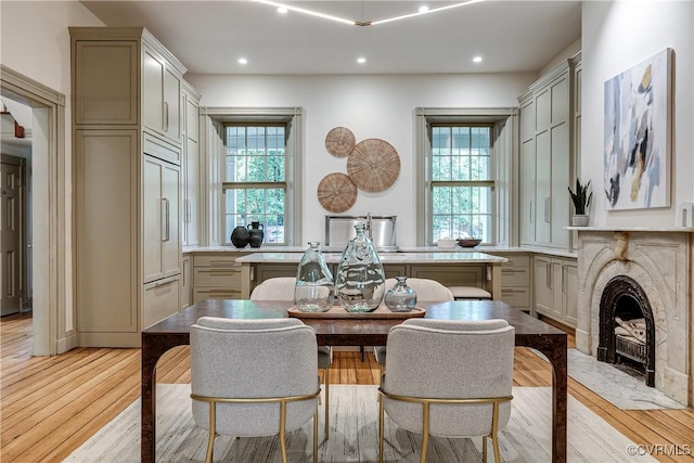 2311 E Broad St, Richmond, VA 23223 - dining area with recessed lighting, light wood-style floors, and a high end fireplace
