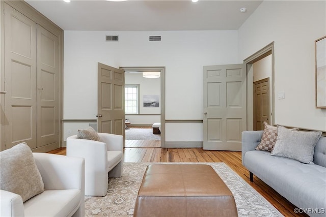 2311 E Broad St, Richmond, VA 23223 - living area with light wood-style flooring