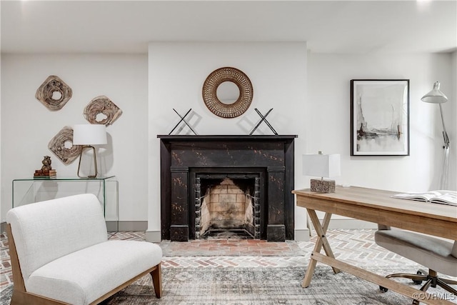 2311 E Broad St, Richmond, VA 23223 - living area with brick flooring, a premium fireplace, an office area, and baseboards