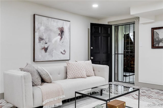 2311 E Broad St, Richmond, VA 23223 - living area with recessed lighting and brick patterned floors