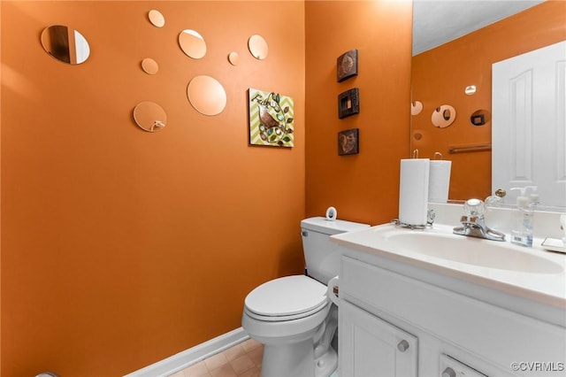 2808 Yellow Wing Ct, Henrico, VA 23231 - bathroom with toilet, vanity, tile patterned flooring, and baseboards