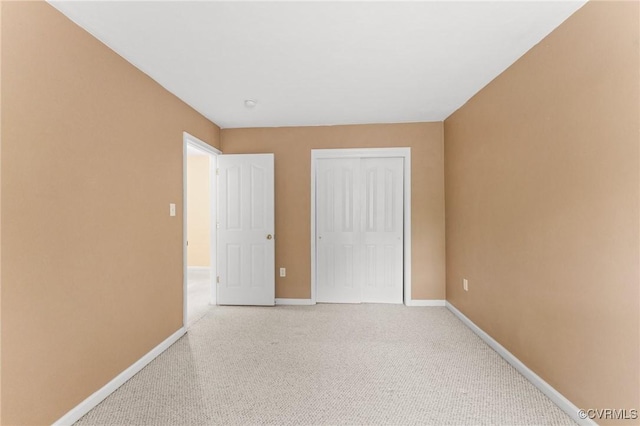 2808 Yellow Wing Ct, Henrico, VA 23231 - unfurnished bedroom with baseboards, light colored carpet, and a closet