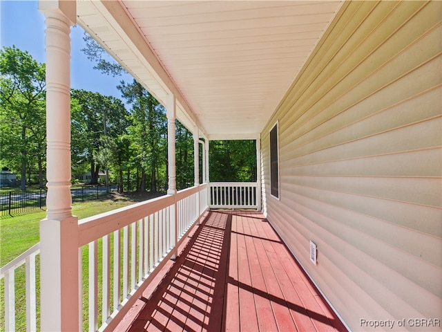 2012 Mark Pine Rd, Hayes, VA 23072 - wooden porch with a yard